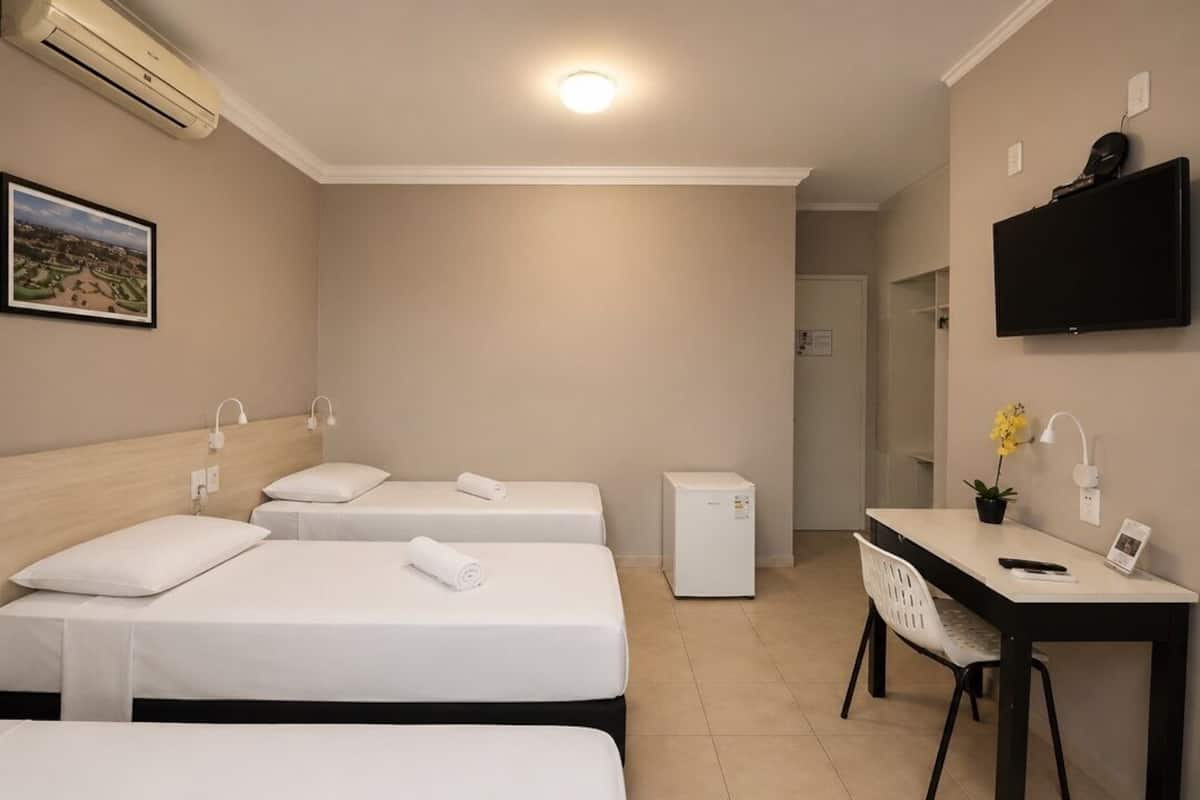 Standard Triple Room | Minibar, desk, iron/ironing board (on request), WiFi (free)