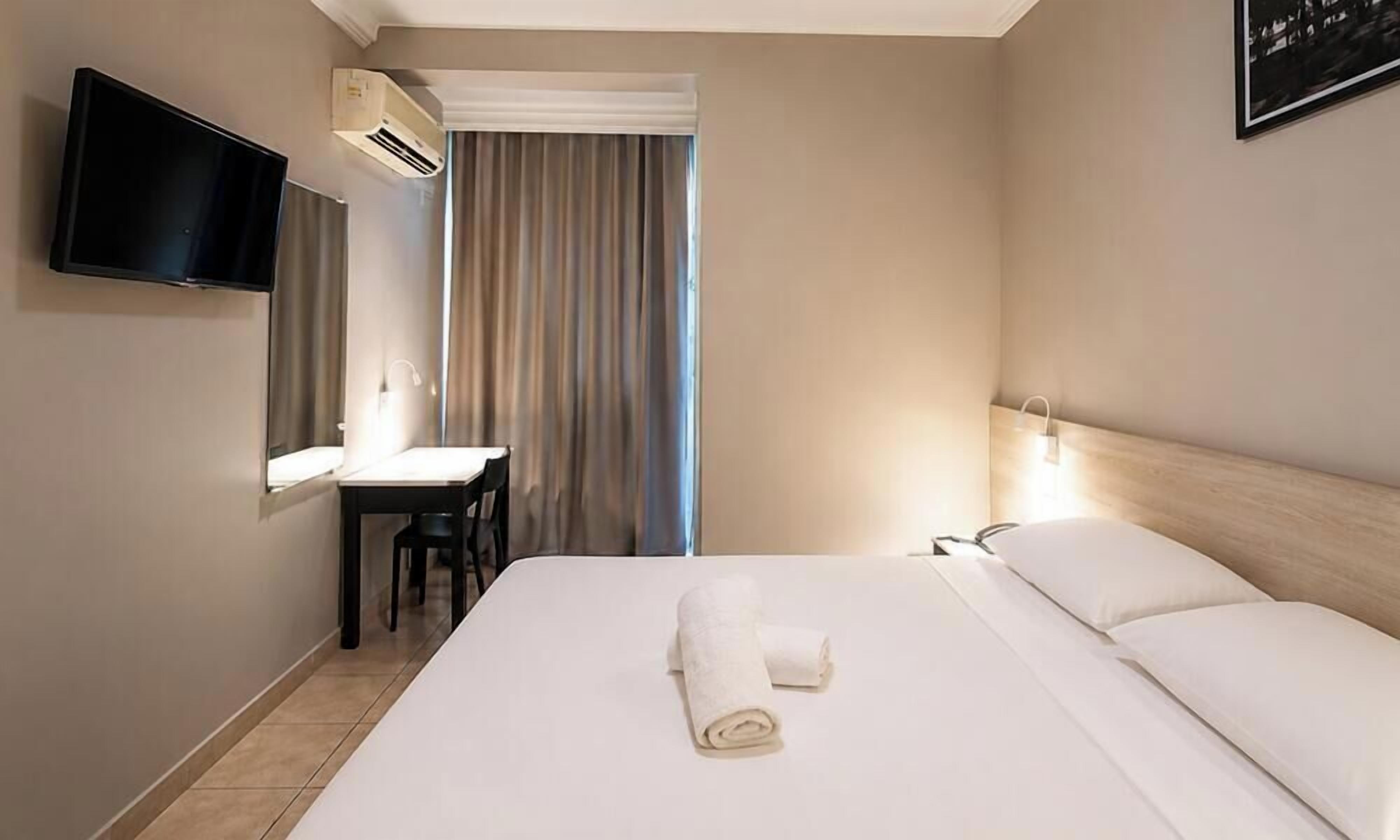 Standard Double Room | Minibar, desk, iron/ironing board (on request), WiFi (free)