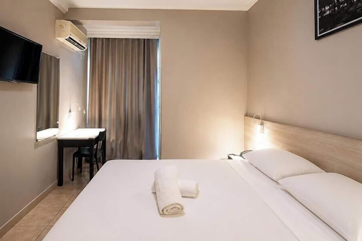 Standard Double Room | Minibar, desk, iron/ironing board (on request), WiFi (free)