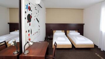 Business Double or Twin Room | Blackout drapes, iron/ironing board, free cribs/infant beds, free WiFi