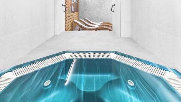 Un'area spa moderna con una grande vasca idromassaggio blu, pareti bianche e una porta in legno che conduce a una zona doccia.