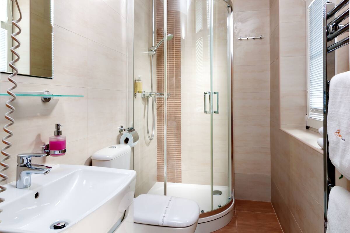 superior double room, 1 king bed | bathroom | free toiletries, hair dryer, towels, soap