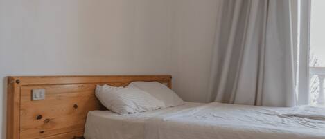 Luxe beddengoed, een kluis op de kamer, een bureau