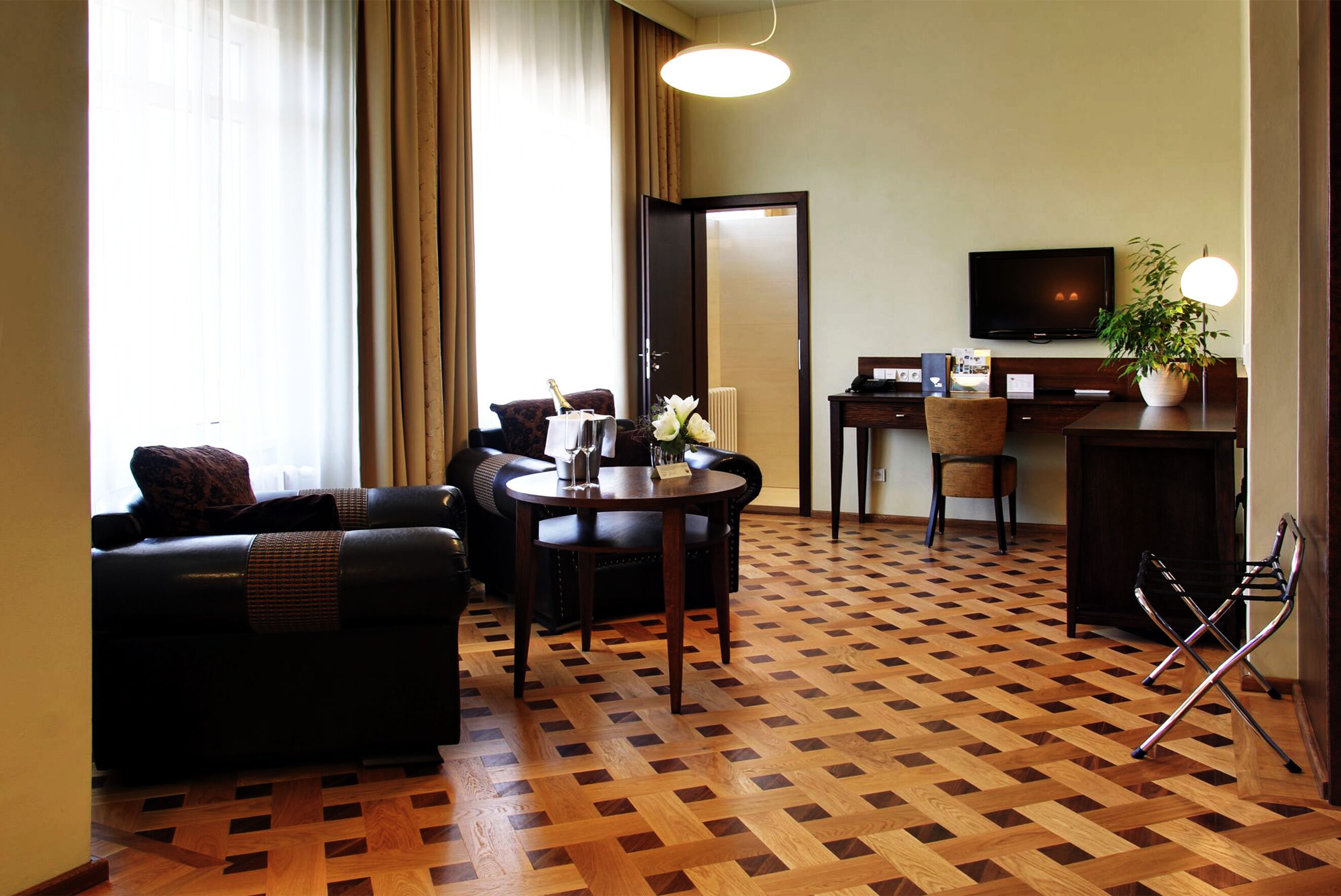 Junior Suite, Sauna | Minibar, in-room safe, desk, blackout drapes