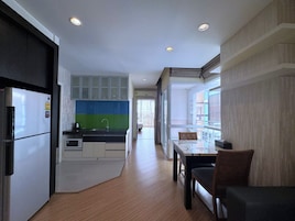 Junior Suite City View | Área de estar | Smart TV 35 polegadas com canais via satélite, Netflix, DVD player