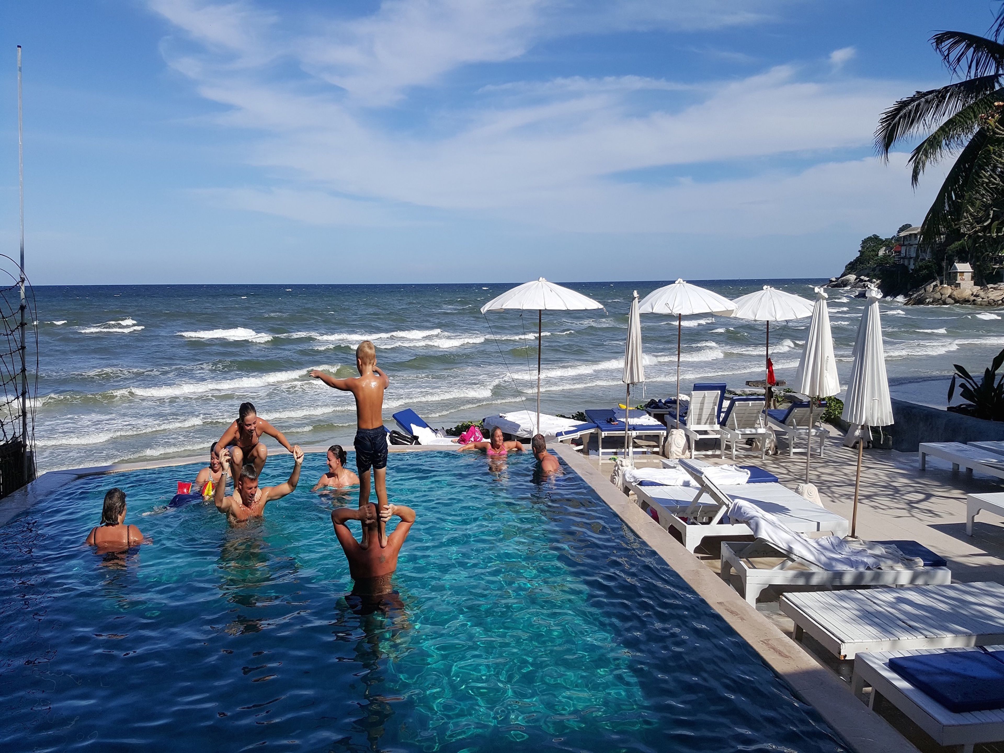 outdoor pool, pool umbrellas, pool loungers