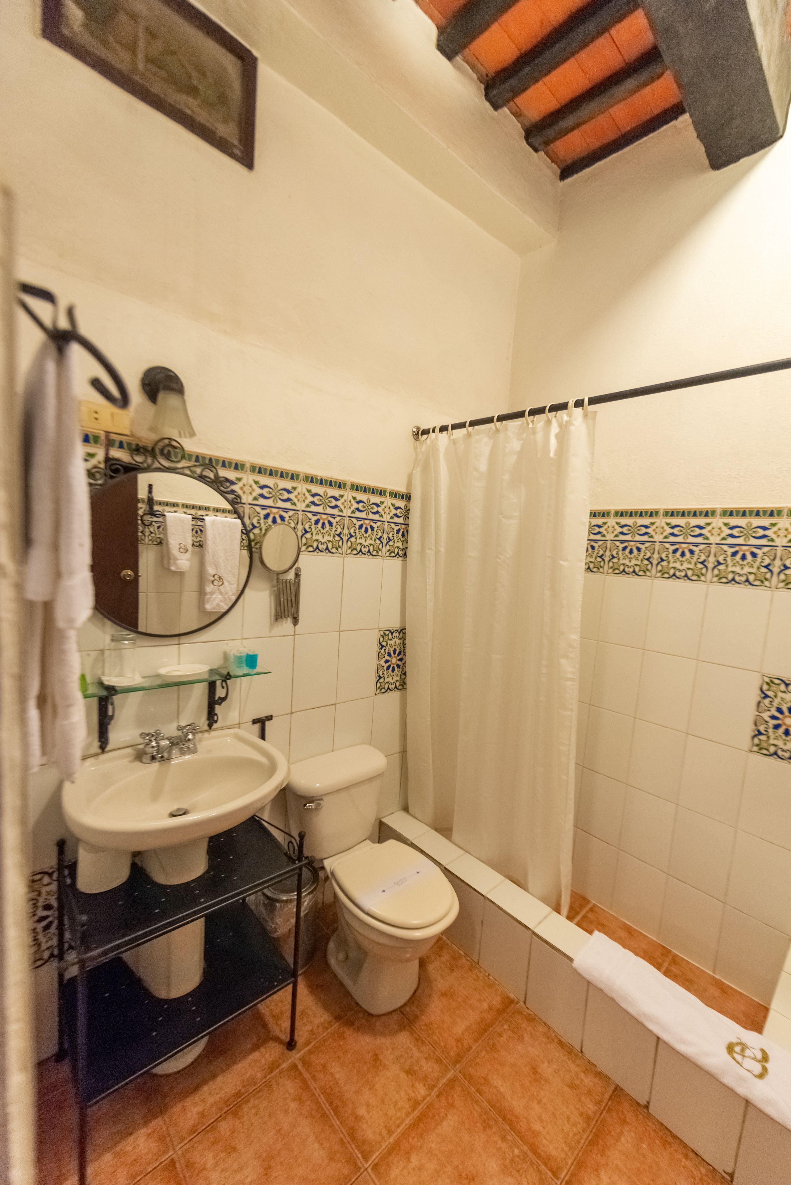 family room | bathroom | shower, free toiletries, hair dryer, towels
