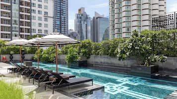 Outdoor pool, open 6:00 AM to 10:00 PM, pool umbrellas, sun loungers