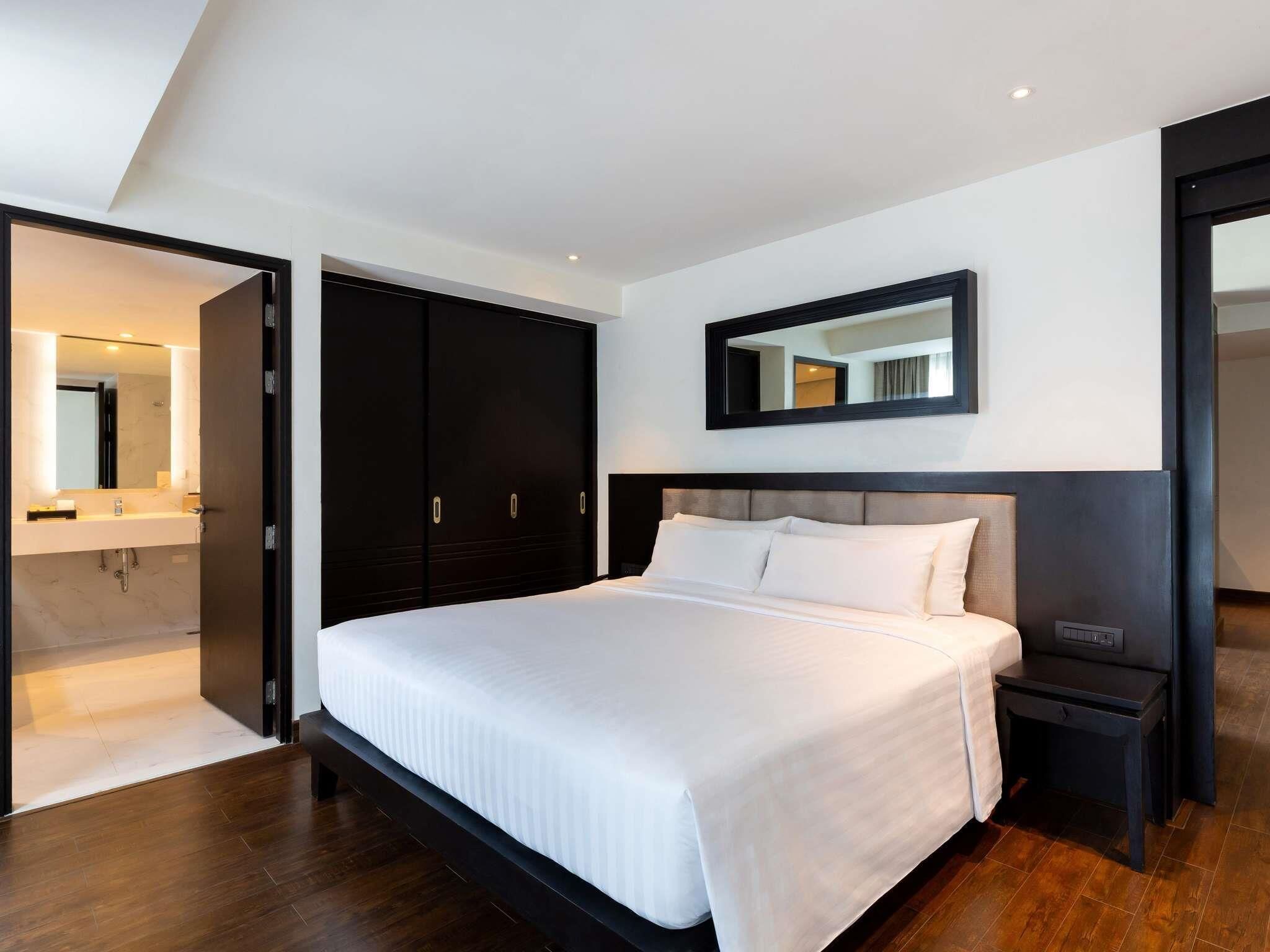Phòng Suite Junior, 1 giường cỡ king | Bộ đồ giường cao cấp, két bảo mật tại phòng, bàn 