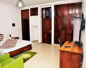 Deluxe-rum | Italienska Frette-lakan, sängtillbehör av högsta kvalitet och minibar