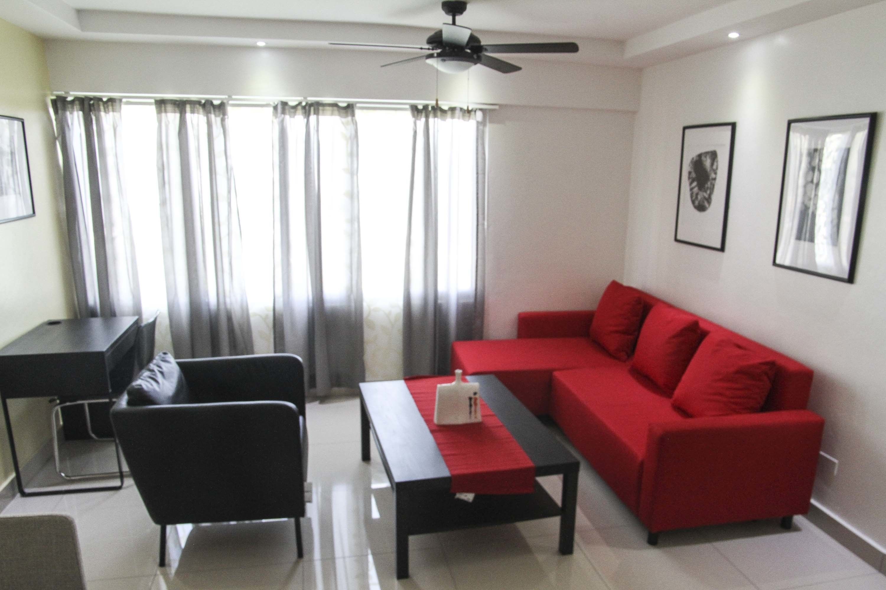 comfort apartment, 1 queen bed, non smoking | living area | 42-inch smart tv with digital channels, tv