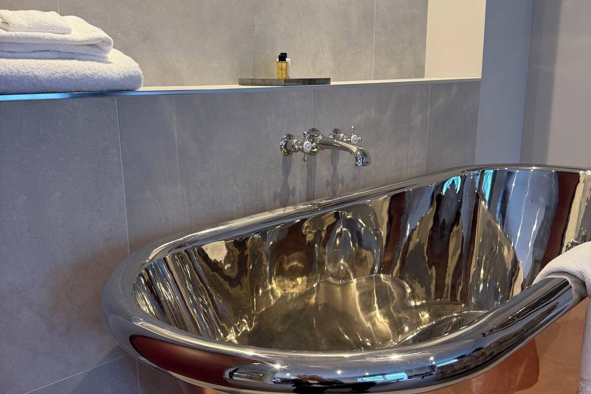 exclusive double room | bathroom | separate bathtub and shower, rainfall showerhead, designer toiletries