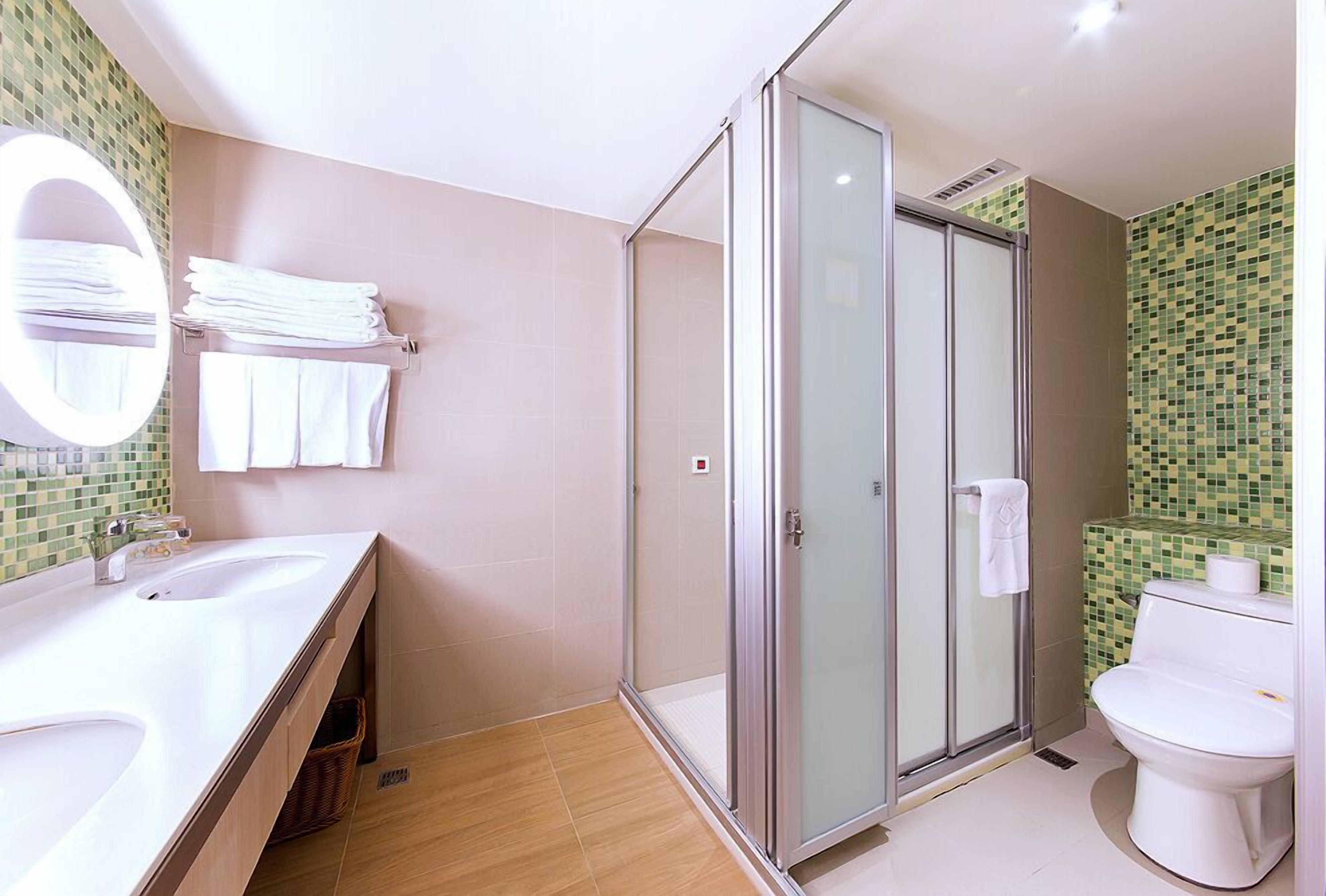 quadruple room | bathroom | shower, hair dryer, towels, soap