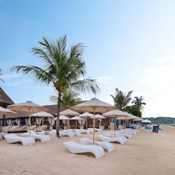 On the beach, sun loungers, beach umbrellas, snorkeling