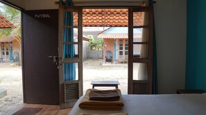 Economy Double Room, Balcony, Garden View | Laptop workspace, free WiFi