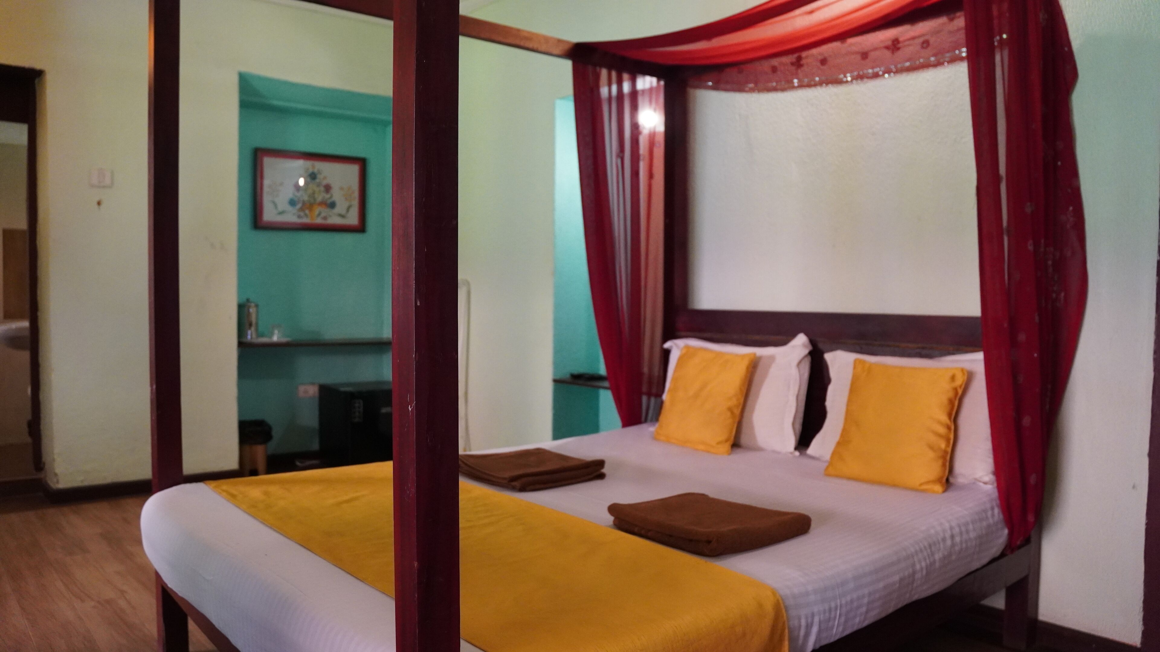 Deluxe Room, Balcony, Garden View | Laptop workspace, free WiFi
