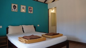 Economy Double Room, Balcony, Garden View | Laptop workspace, free WiFi