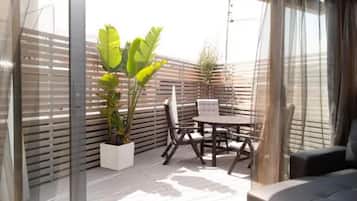 Suite, balcón | Terraza o patio