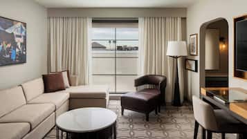 Suite, 1 Bedroom | Living room | 42-inch flat-screen TV with cable channels, TV