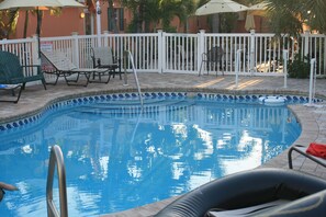 Outdoor pool, open 7:00 AM to 9:00 PM, pool umbrellas, pool loungers