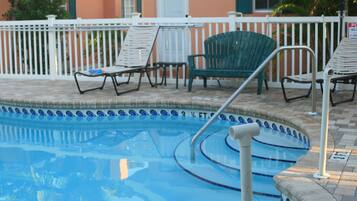 Outdoor pool, open 7:00 AM to 9:00 PM, pool umbrellas, sun loungers