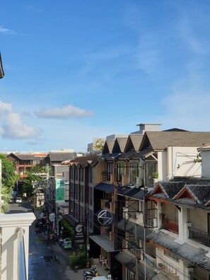 A multi-story building with a mix of architectural styles, including a modern facade and traditional elements.