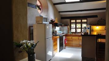 Full-sized fridge, microwave, stovetop, espresso maker