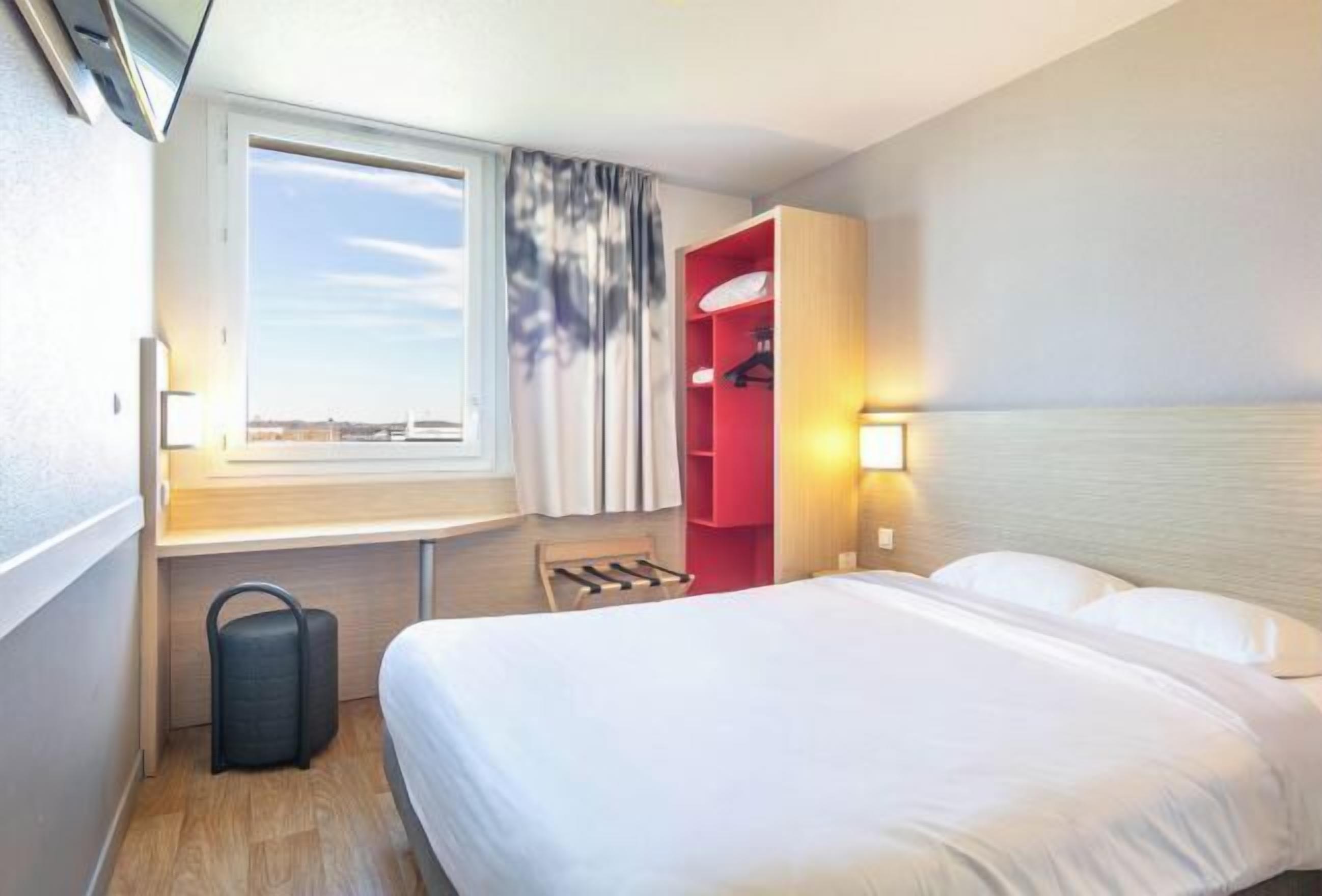 Premium bedding, desk, blackout curtains, soundproofing