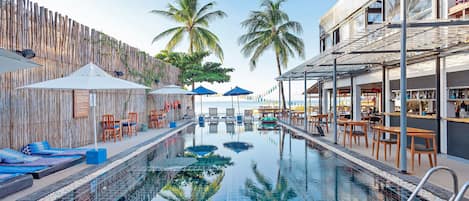 Outdoor pool, open 7:00 AM to 6:00 PM, pool umbrellas, sun loungers