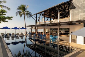 Outdoor pool, open 7:00 AM to 6:00 PM, pool umbrellas, sun loungers