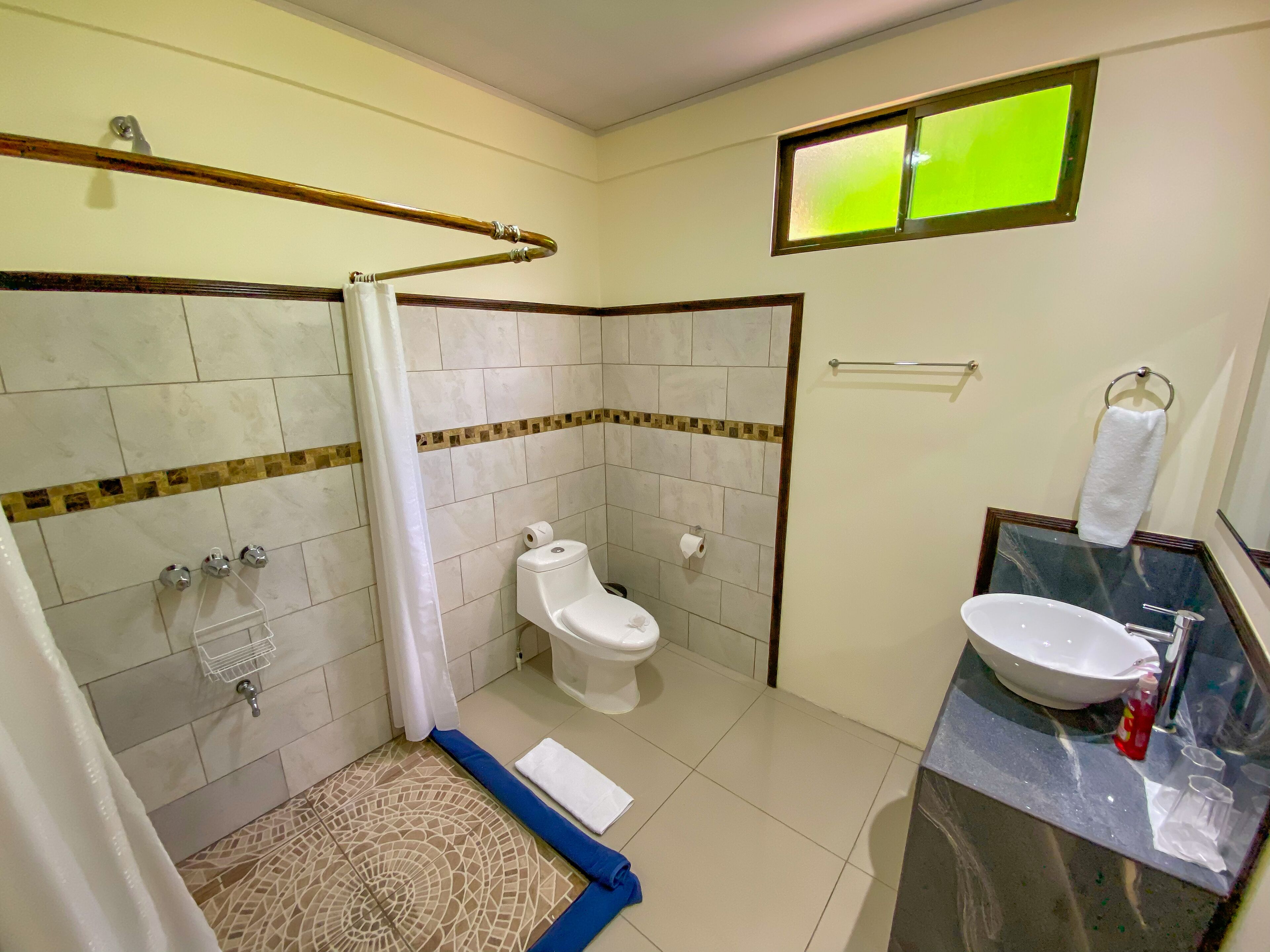 superior room, multiple beds | bathroom | shower, rainfall showerhead, free toiletries, hair dryer