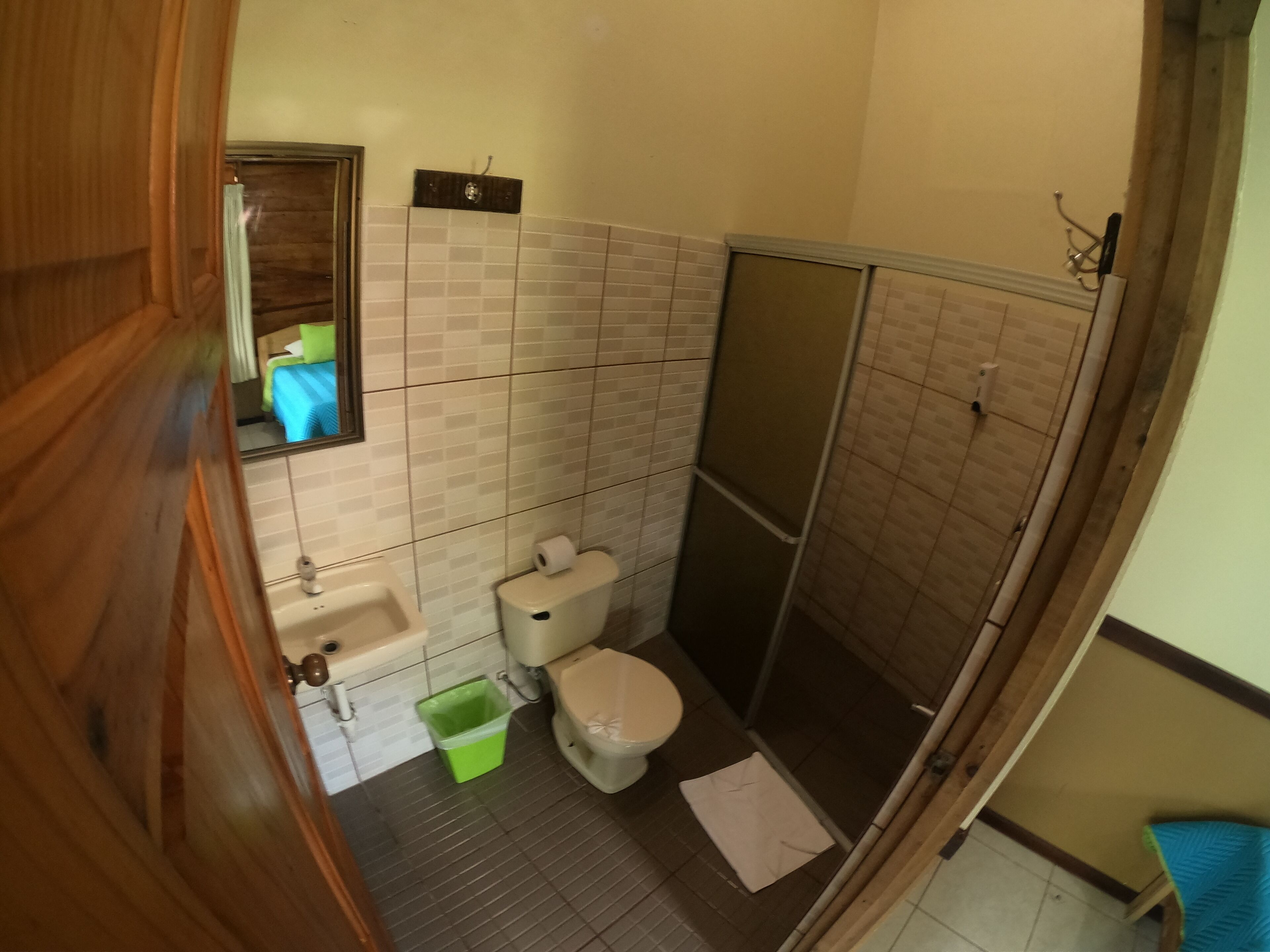 family room | bathroom | shower, rainfall showerhead, free toiletries, hair dryer