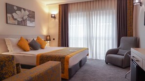 Standard Room | Premium bedding, minibar, in-room safe, iron/ironing board