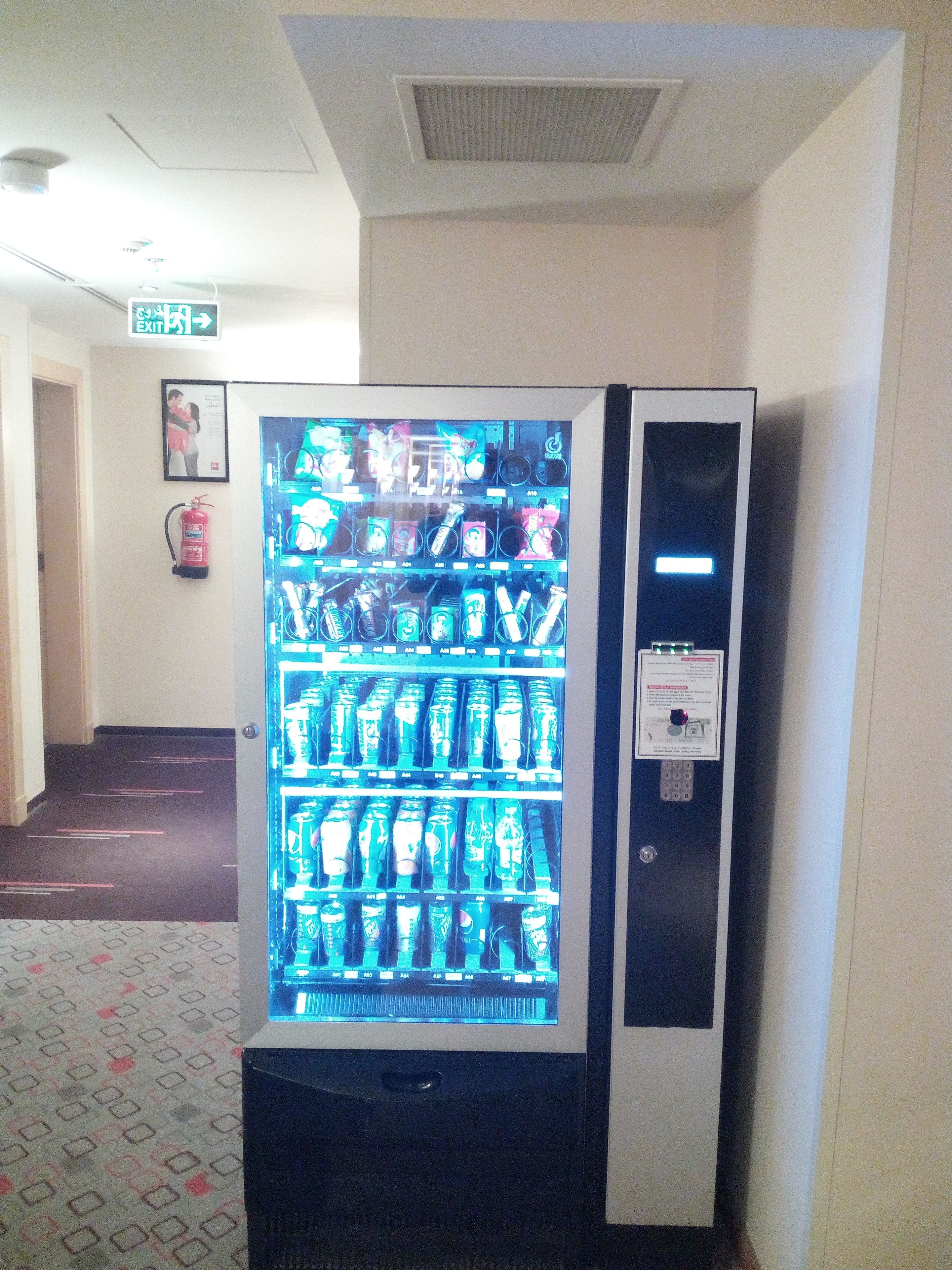 A vending machine with various beverages and snacks.