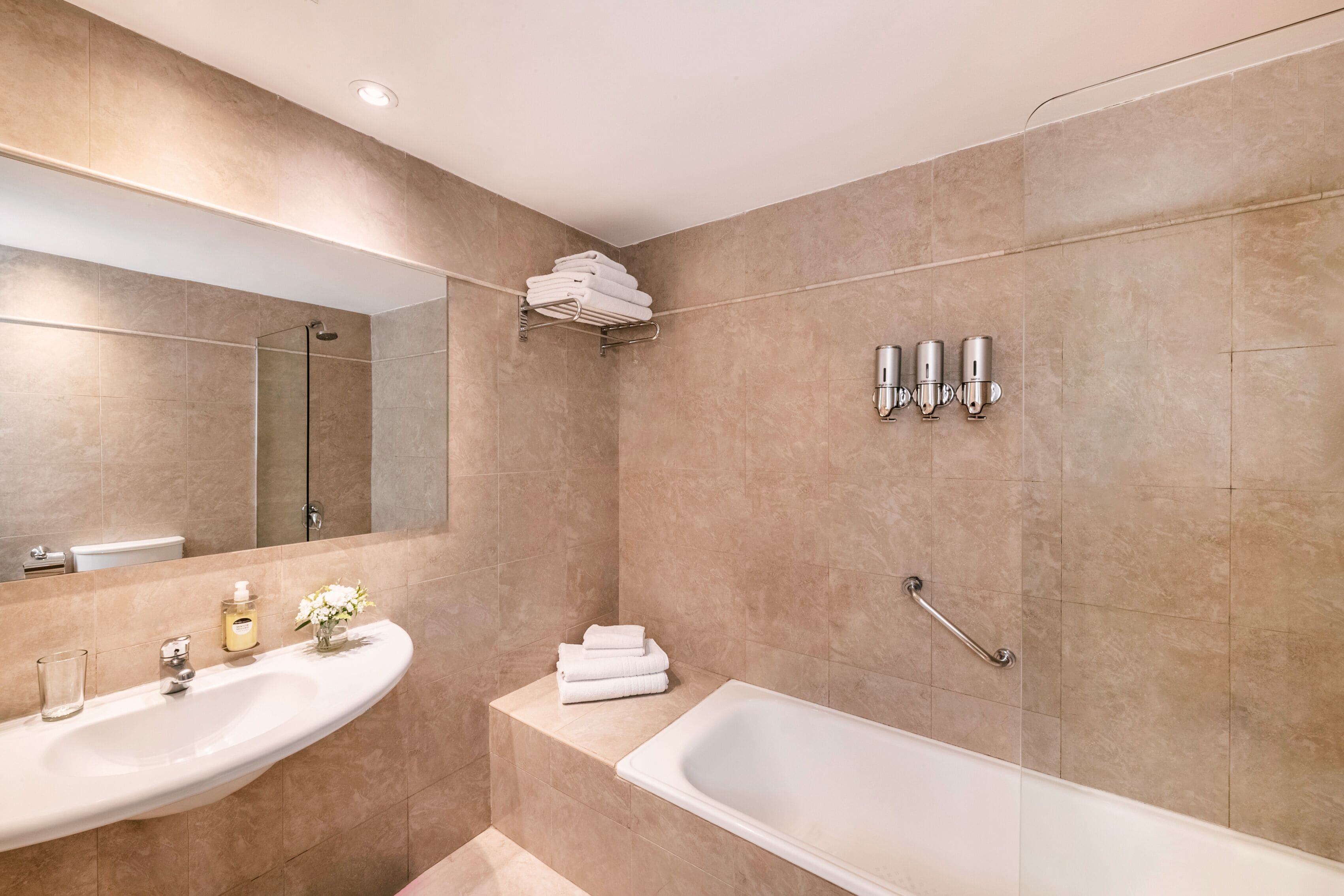 combined shower/bathtub, deep-soaking bathtub, rainfall showerhead