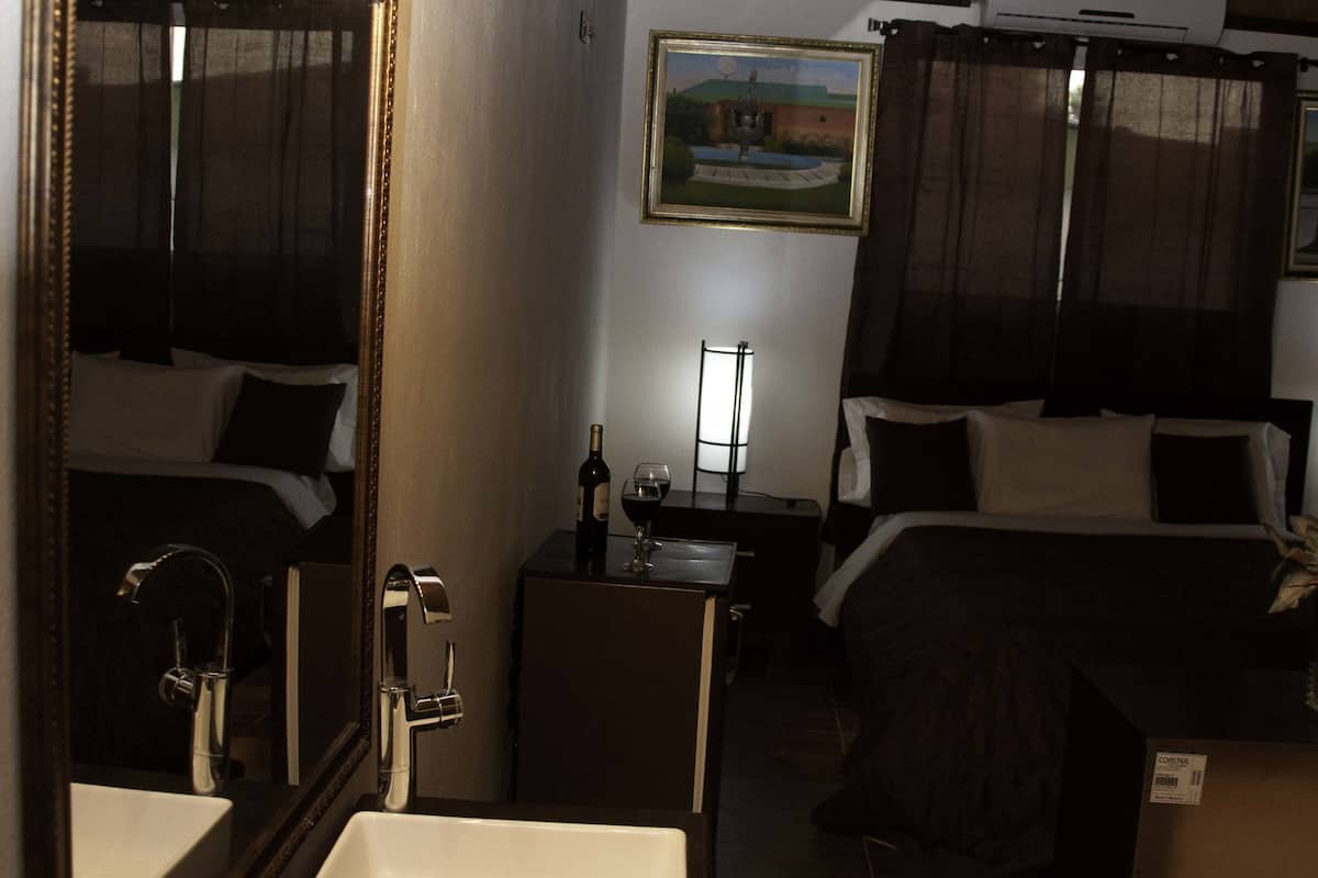 deluxe room | down duvets, select comfort beds, individually decorated