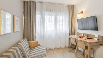 Apartment | Living area | Flat-screen TV