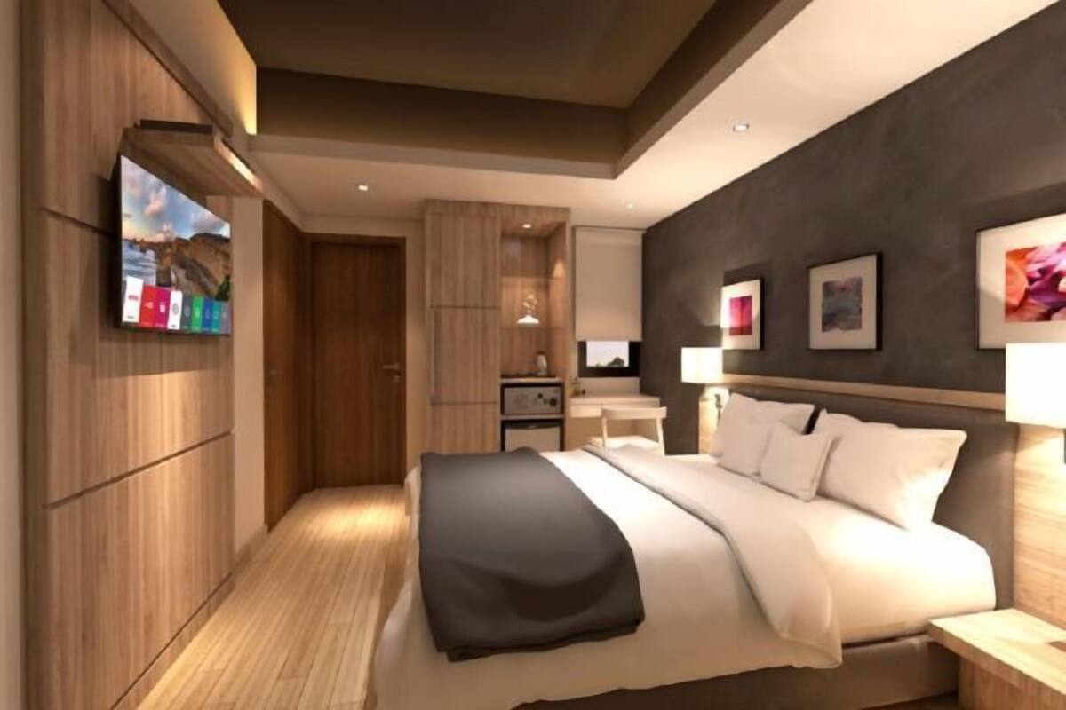 Egyptian cotton sheets, down comforters, pillowtop beds, minibar