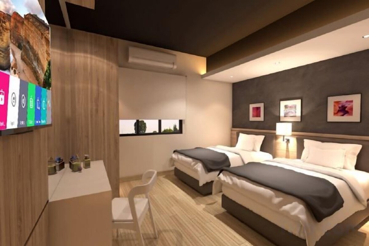 Egyptian cotton sheets, down comforters, pillowtop beds, minibar