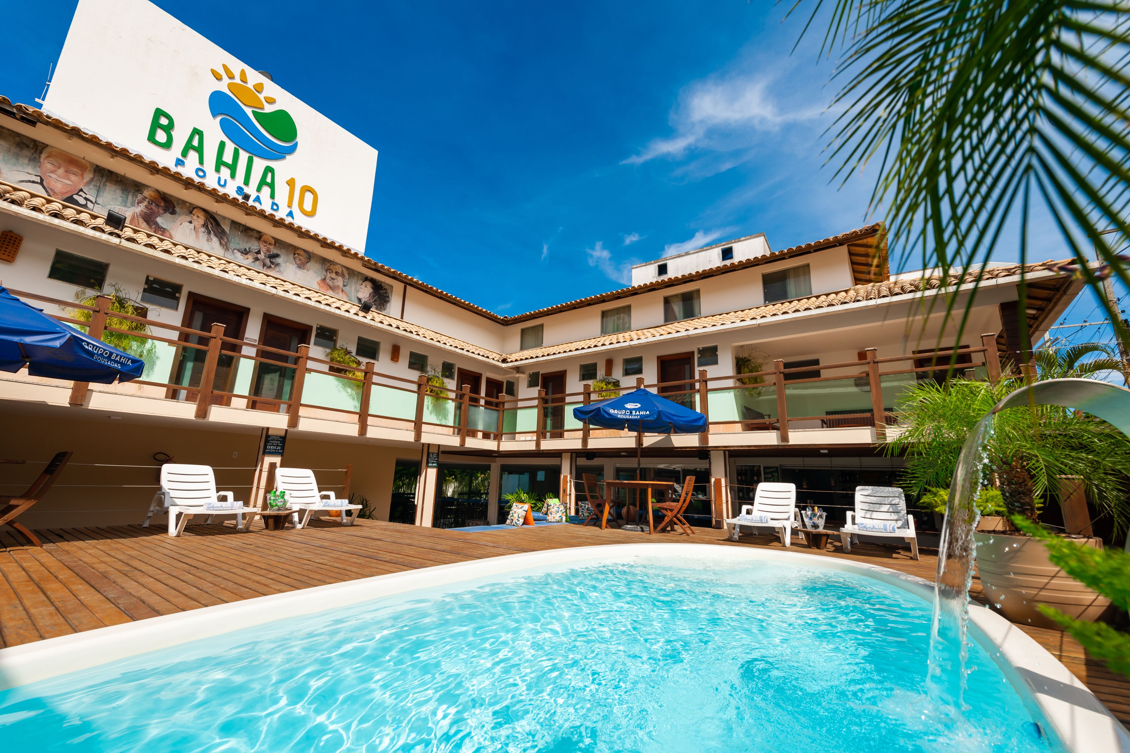 outdoor pool, pool umbrellas, pool loungers