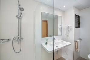 Shower, rainfall showerhead, towels