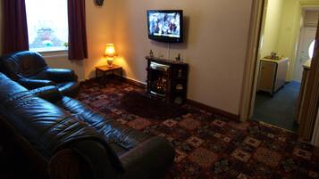 Iron/ironing board, cots/infant beds