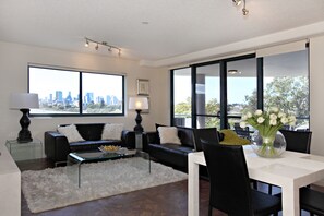 Premium Two-Bedroom Apartment | Living area | 50-inch TV with digital channels - Inn on the Park Apartments (Toowong)