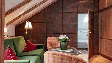 Junior Suite | Living area | TV, DVD player, iPod dock