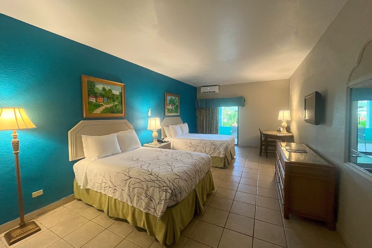 Room, 2 Double Beds, Garden View | In-room safe, individually furnished, iron/ironing board