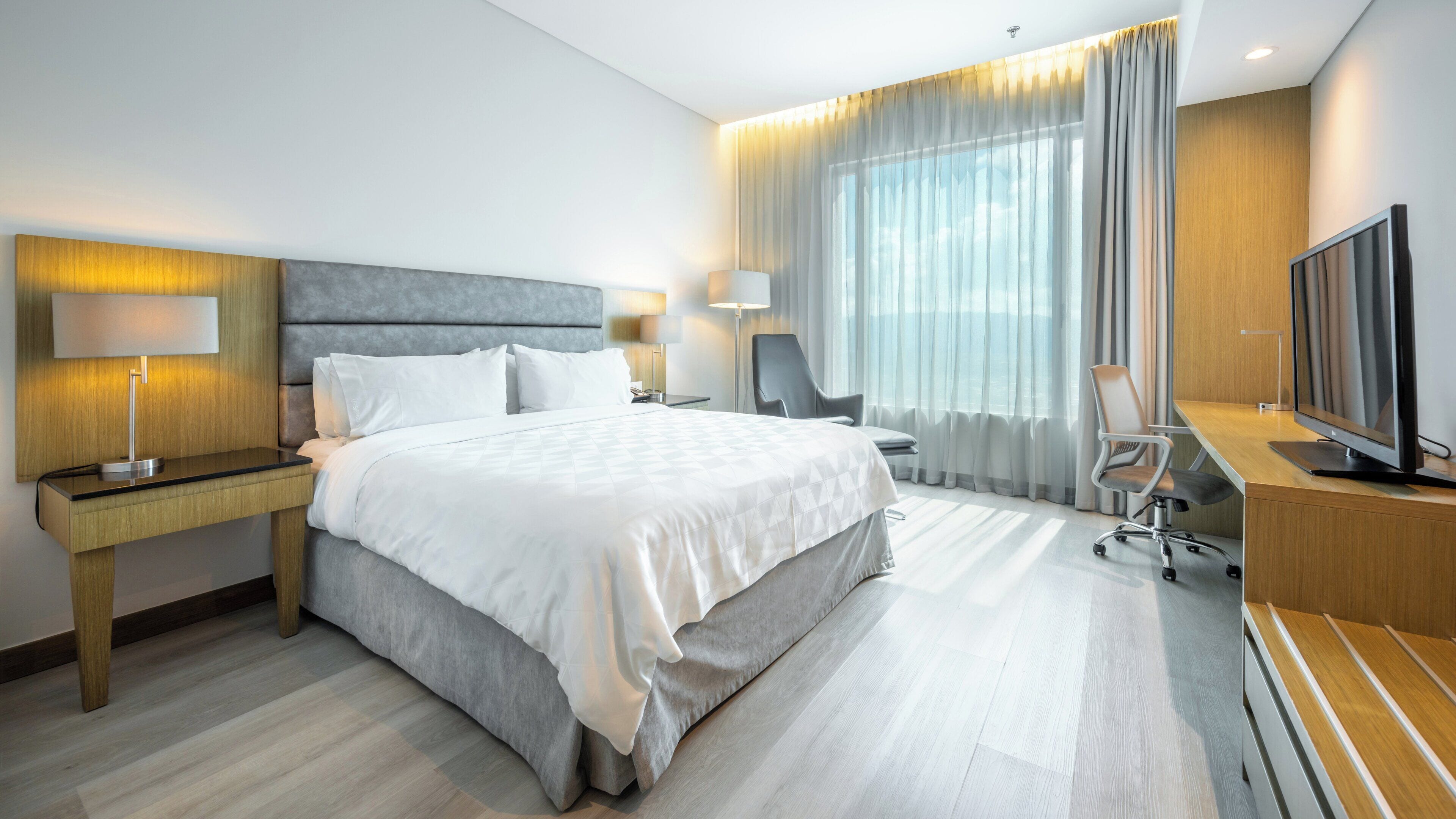 Hochwertige Bettwaren, Daunenbettdecken, Minibar, Zimmersafe