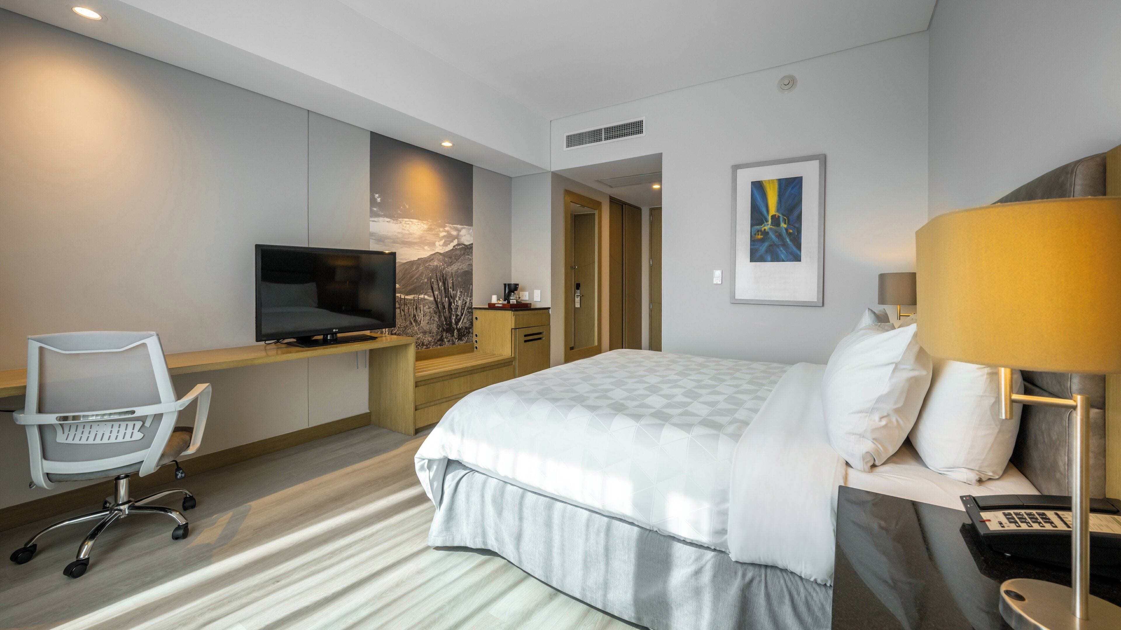 Luxe beddengoed, donsdekens, een minibar, een kluis op de kamer
