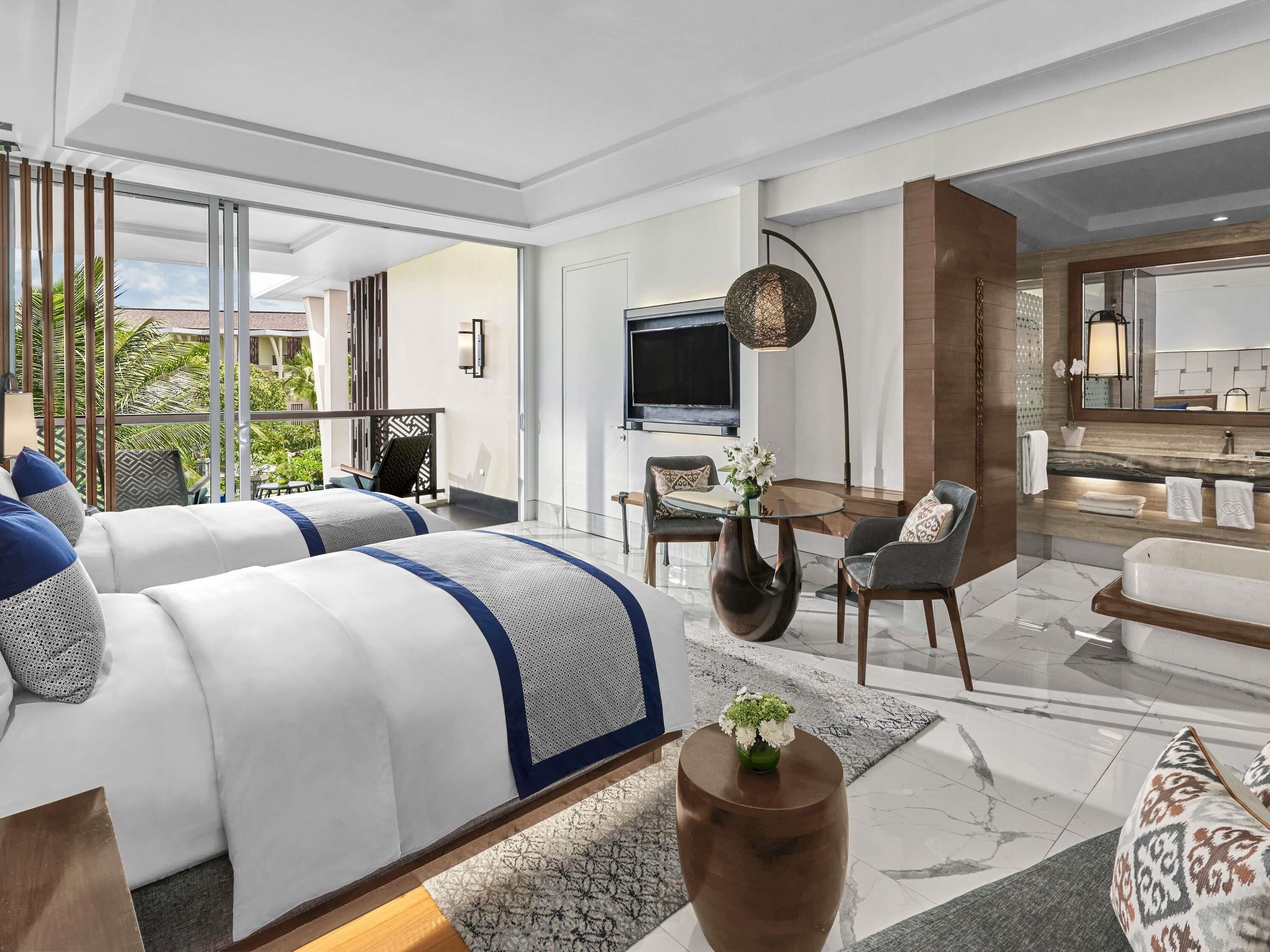 Premium bedding, down comforters, minibar, in-room safe