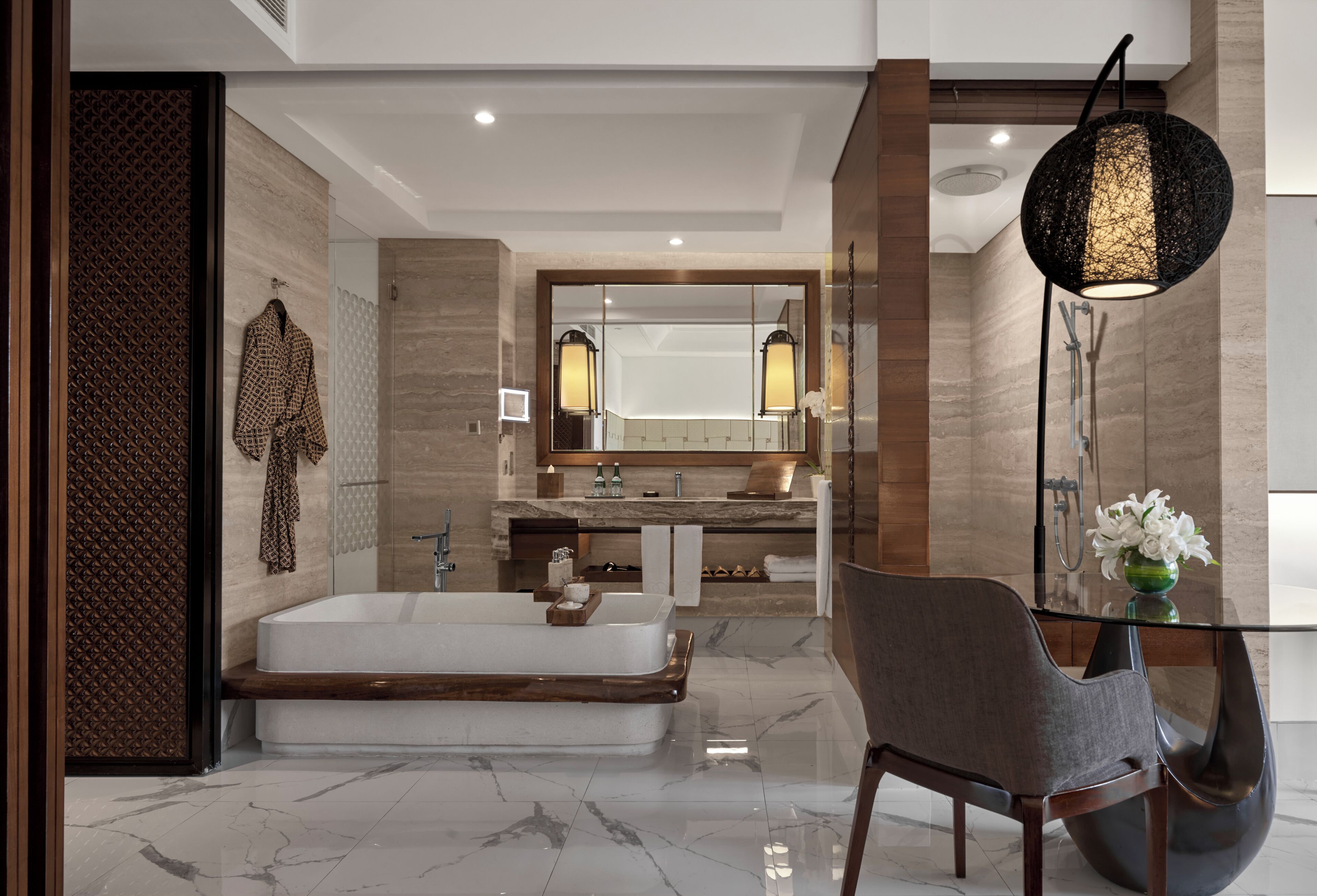 separate bathtub and shower, deep-soaking bathtub, designer toiletries