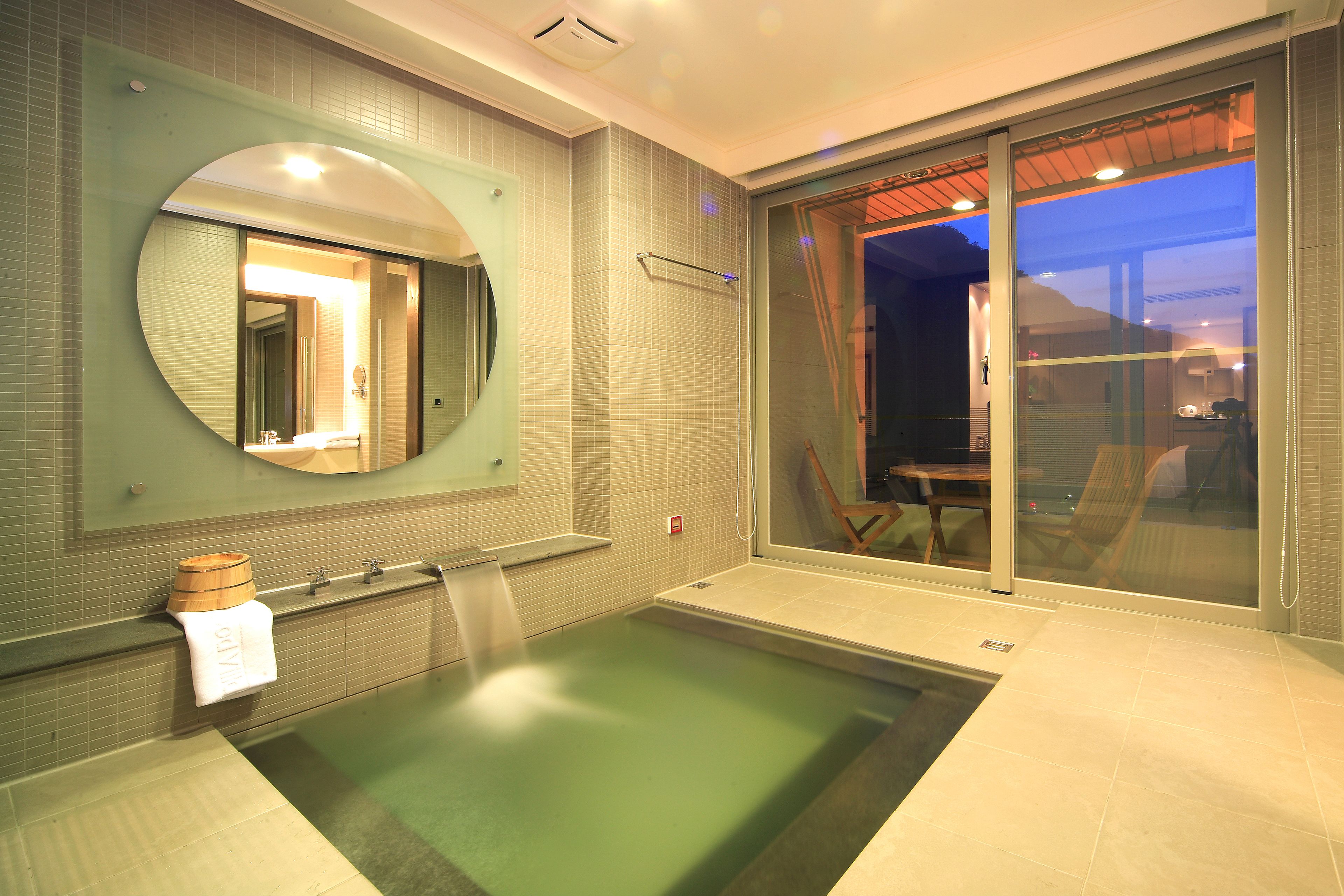 elite double room | bathroom | spring water bathtub, free toiletries, hair dryer, slippers